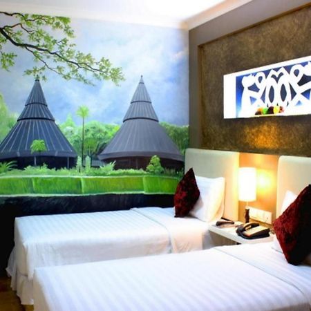 Amos Cozy Hotel Melawai Giacarta Esterno foto