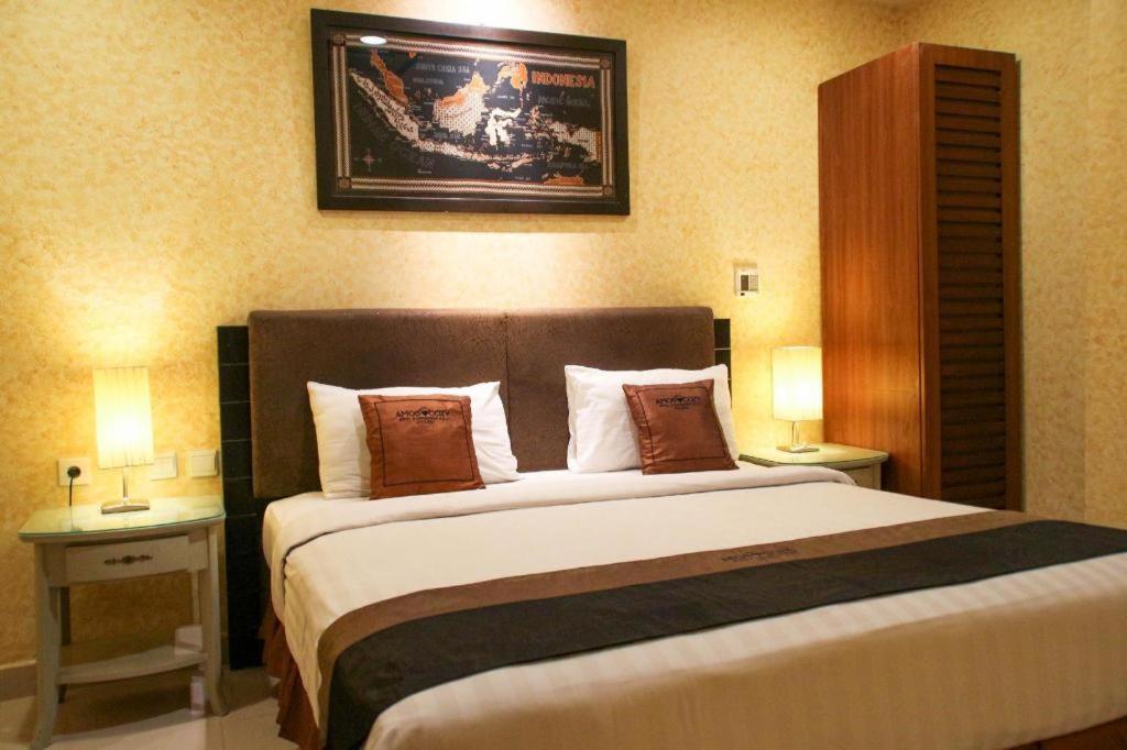 Amos Cozy Hotel Melawai Giacarta Esterno foto