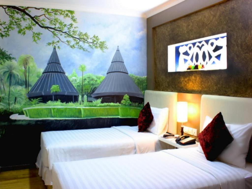 Amos Cozy Hotel Melawai Giacarta Esterno foto
